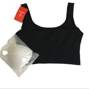 Freeye black sports bra with padding inserts. Sz Large. New